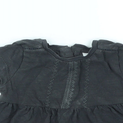 Close-up detail of Next girls’ black basic t-shirt size newborn