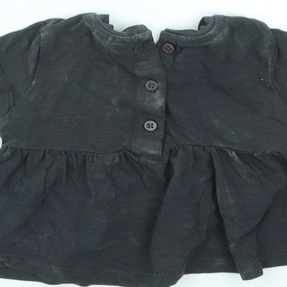 Brand and care label for Next girls’ black basic t-shirt size newborn