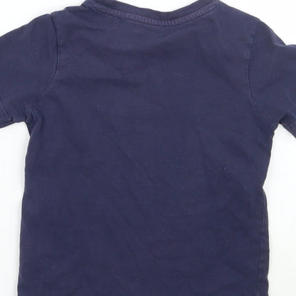 Brand and care label for Nutmeg girls’ purple basic t-shirt, size 2, years