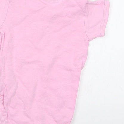 Brand and care label for Early Days girls’ pink babygrow one-piece, size 0-3, months