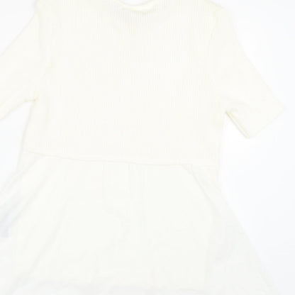 Brand and care label for Miss Selfridge women’s white basic t-shirt, size UK 10