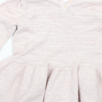 Brand and care label for Matalan girls’ pink a-line, size 18-24, months