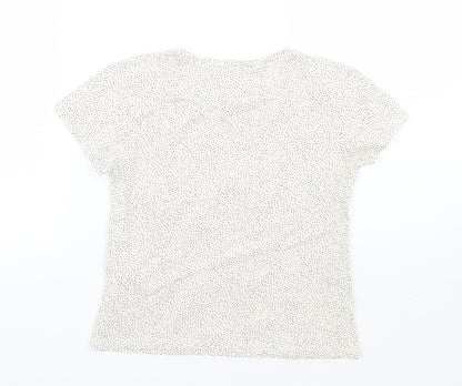 Back view of H&M girls’ beige polka dot basic t-shirt, size 5, years