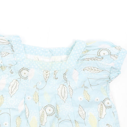 Close-up detail of Matalan girls’ blue floral basic blouse, size 3-6, months
