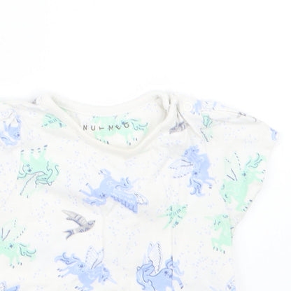 Close-up detail of Nutmeg girls’ blue geometric basic t-shirt, size 6-9, months - unicorn