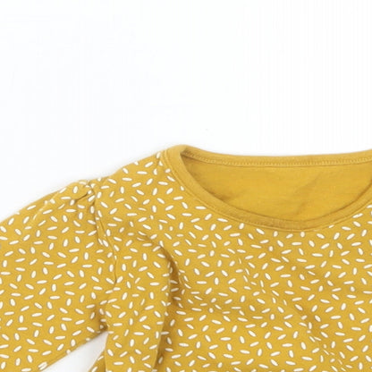 Close-up detail of Tu girls’ yellow geometric basic t-shirt, size 3-6, months