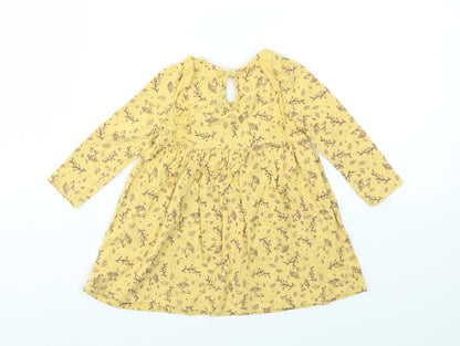 Back view of SO CUTE girls’ yellow animal print fit & flare, size 9-12, months