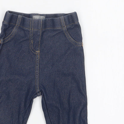 Close-up detail of Next girls’ blue leggings, size 9-12, months