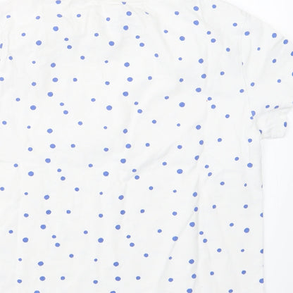 Brand and care label for Next girls’ blue polka dot basic t-shirt, size 10, years