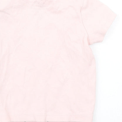 Brand and care label for F&F girls’ pink basic t-shirt, size 6-9, months