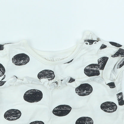 Close-up detail of Nutmeg girls’ multicoloured spotted basic t-shirt, size 0-3, months