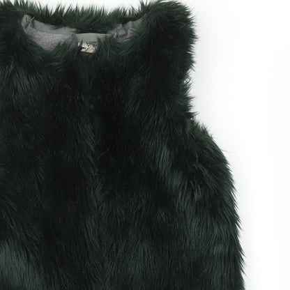 Close-up detail of Next girls’ green gilet jacket, size 6, years