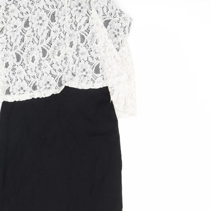 Brand and care label for Miss Selfridge women’s black mini, size UK 6