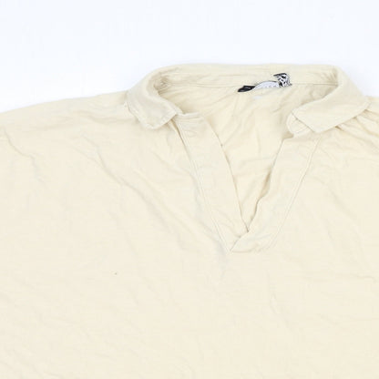 Close-up detail of ASOS women’s ivory cotton basic blouse, size M, collared