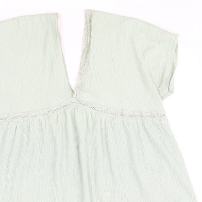 Close-up detail of ASOS women’s green polyester shift, size UK 16, v-neck pullover - lace trim