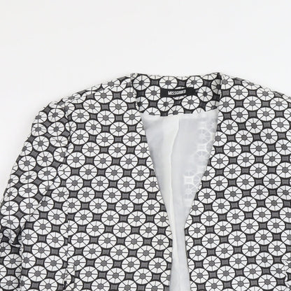Close-up detail of Missguided women’s grey geometric polyester jacket blazer, size UK 10