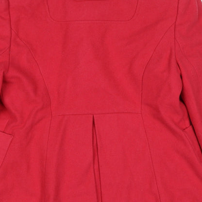 Brand and care label for Red Herring women’s pink jacket, size UK 12, button