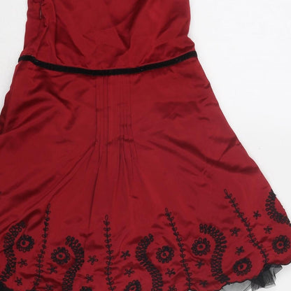 Brand and care label for Autograph girls’ red floral polyester fit & flare, size 5, years v-neck zip