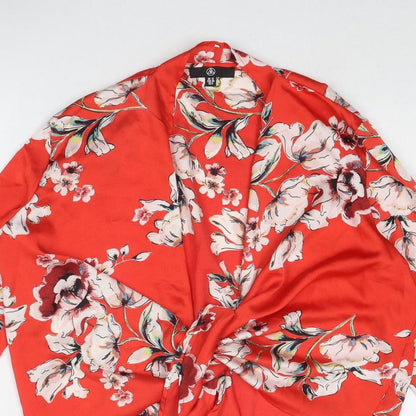 Close-up detail of Missguided women’s red floral polyester basic blouse, size UK 10, v-neck - tie front