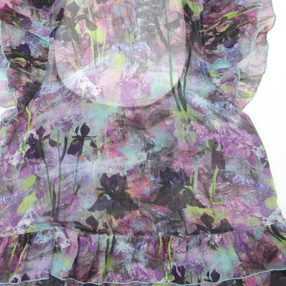 Brand and care label for Miss Selfridge women’s purple geometric polyester basic blouse, size UK 12, scoop neck