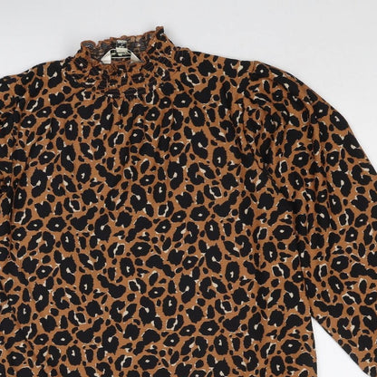 Close-up detail of Miss Selfridge women’s brown animal print polyester a-line, size UK 12, mock neck pullover - leopard print