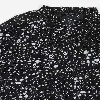 Close-up detail of In the Style women’s black geometric polyester basic blouse, size UK 16, mock neck