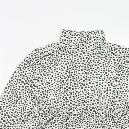 Close-up detail of I SAW IT FIRST women’s white animal print polyester basic blouse, size UK 10, high neck - dalmatian print