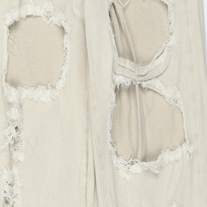 Close-up detail of Missguided women’s beige cotton mom jeans, size UK 12, regular zip