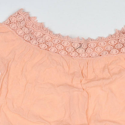 Close-up detail of Miss Selfridge women’s pink viscose basic blouse, size UK 12, boat neck