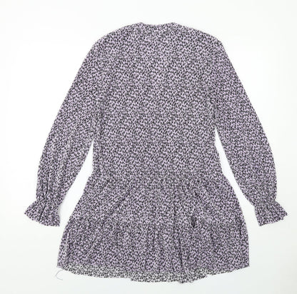Back view of ASOS women’s purple floral polyester a-line, size UK 4, v-neck pullover