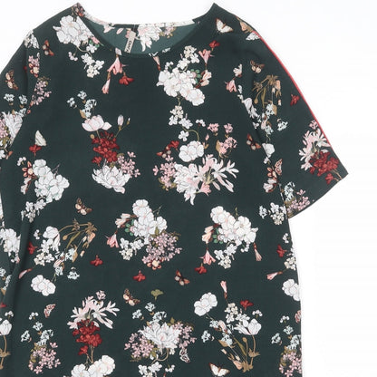 Close-up detail of Only women’s green floral polyester skater dress, size UK 8, round neck pullover