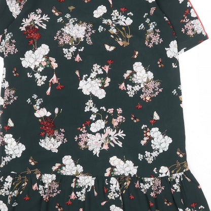 Brand and care label for Only women’s green floral polyester skater dress, size UK 8, round neck pullover
