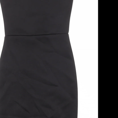 Brand and care label for Missguided women’s black polyester bodycon, size UK 8, round neck pullover