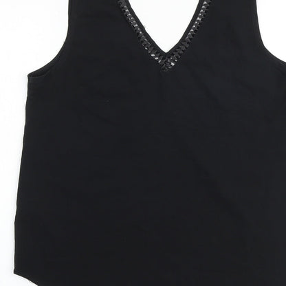 Brand and care label for ASOS women’s black polyester basic tank, size UK 10, v-neck