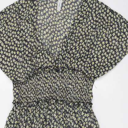 Close-up detail of Only women’s black floral polyester fit & flare, size S, v-neck pullover