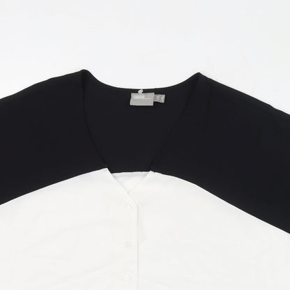 Close-up detail of ASOS women’s black colourblock polyester basic button-up, size UK 8, v-neck