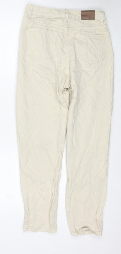 Back view of Missguided women’s beige cotton mom jeans, size UK 10, regular zip