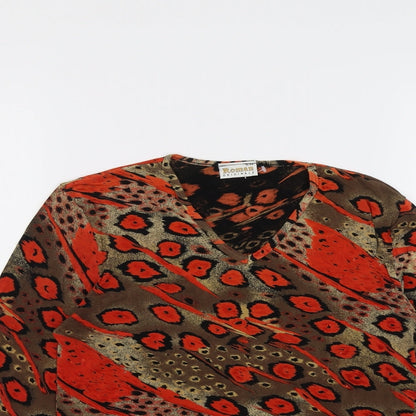 Close-up detail of Roman women’s multicoloured geometric acetate basic blouse, size S, v-neck