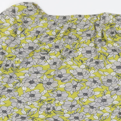 Brand and care label for Miss Selfridge women’s yellow floral polyester basic blouse, size UK 6, off the shoulder