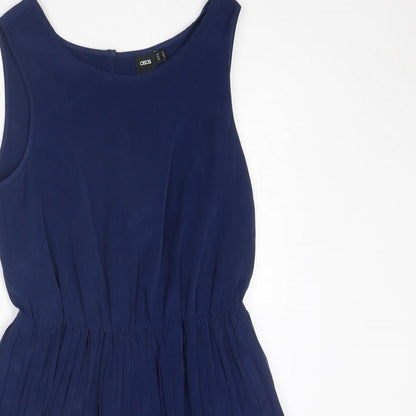 Close-up detail of ASOS women’s blue colourblock polyester fit & flare, size UK 10, round neck button
