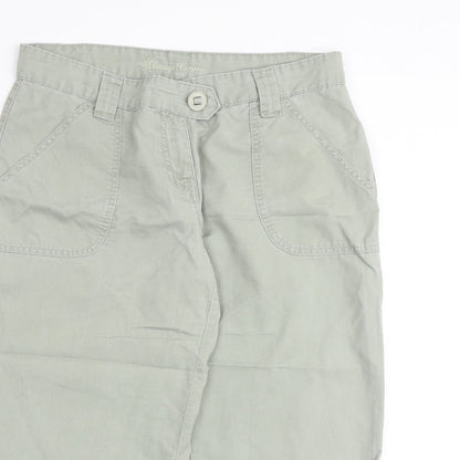 Close-up detail of Vintage Canvas women’s green cotton chino trousers, size UK 12, regular zip