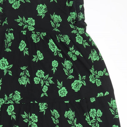 Close-up detail of ASOS women’s black floral polyester a-line, size UK 12, round neck button