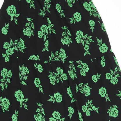 Brand and care label for ASOS women’s black floral polyester a-line, size UK 12, round neck button