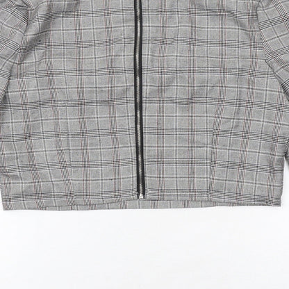 Brand and care label for Missguided women’s grey plaid polyester cropped blouse, size UK 12, boat neck
