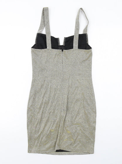 Back view of Missguided women’s gold polyester mini, size UK 8, sweetheart zip