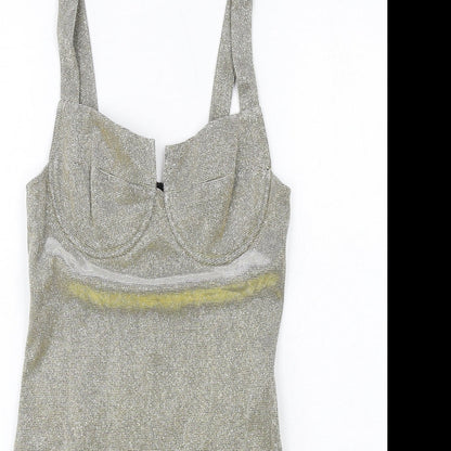 Close-up detail of Missguided women’s gold polyester mini, size UK 8, sweetheart zip