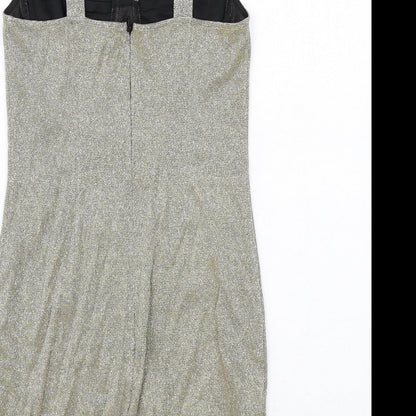 Brand and care label for Missguided women’s gold polyester mini, size UK 8, sweetheart zip