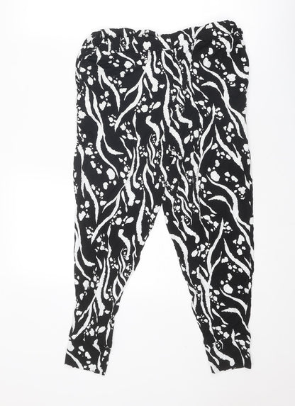 Back view of Missguided women’s black geometric viscose capri trousers, size UK 12, regular