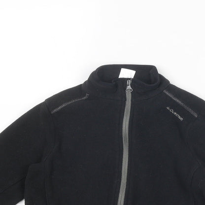 Close-up detail of Quechua boys’ black jacket, size 8, years zip