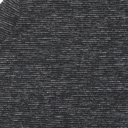 Brand and care label for Dunnes women’s black striped polyester basic blouse, size M, round neck
